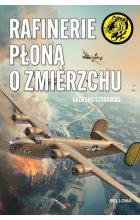 Rafinerie płoną o zmierzchu